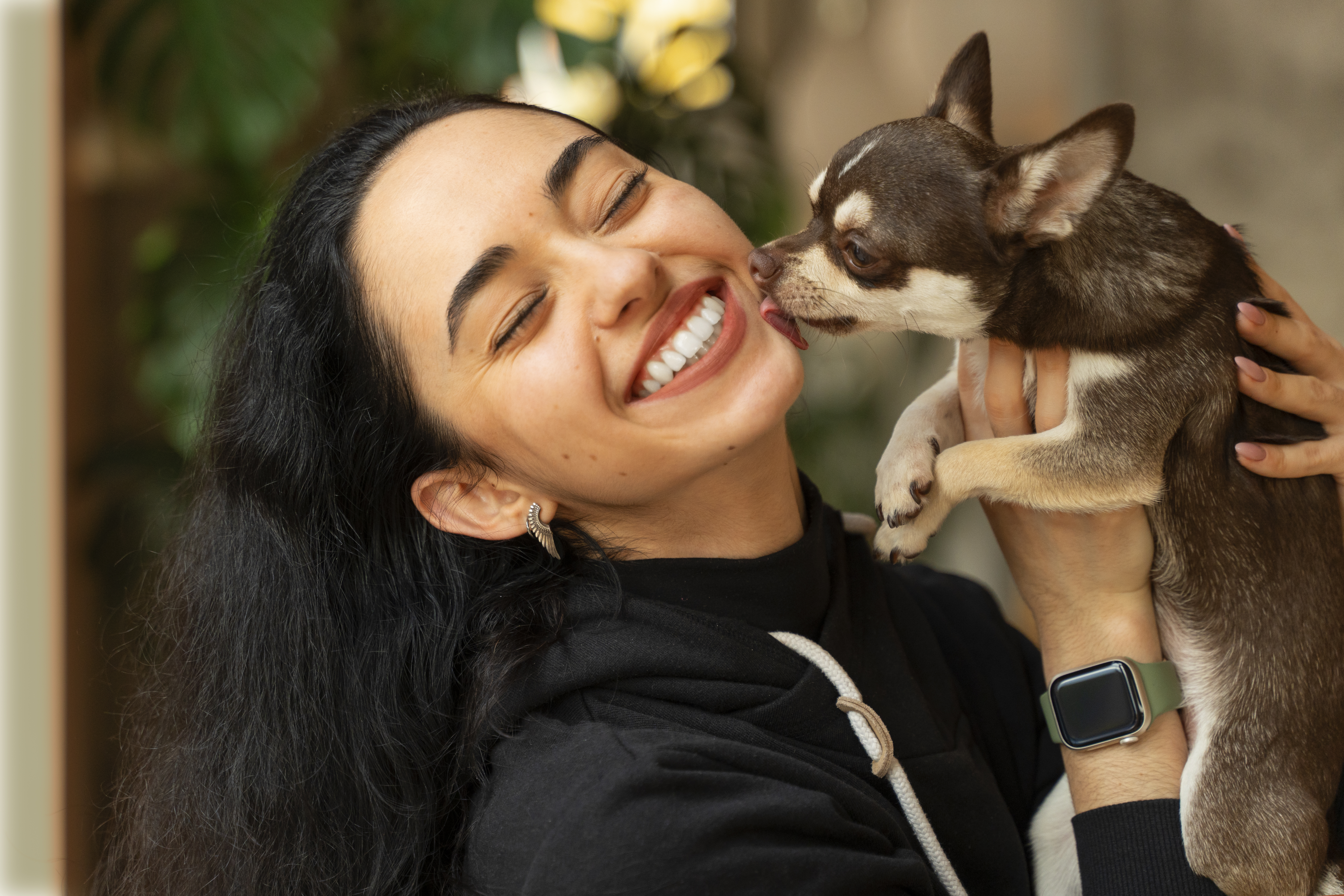 Happy owner interacting with pet